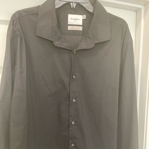 Men’s solid black dress shirt.